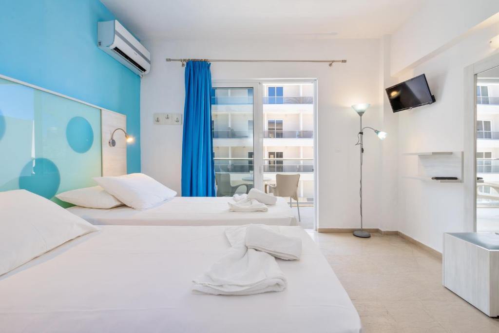 Postel nebo postele na pokoji v ubytování Santa Maria City Hotel