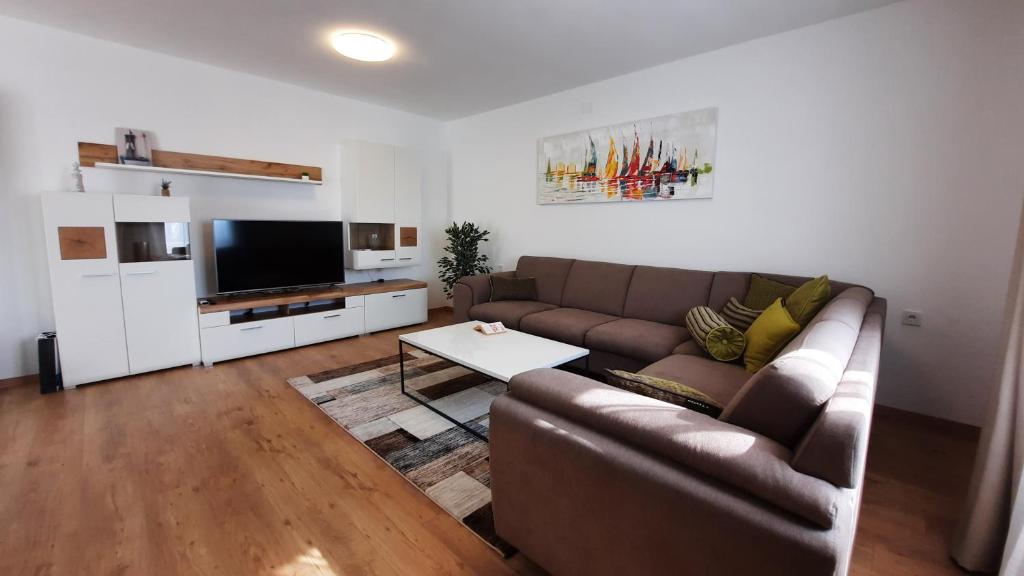 Telewizja i/lub zestaw kina domowego w obiekcie Apartman Ela