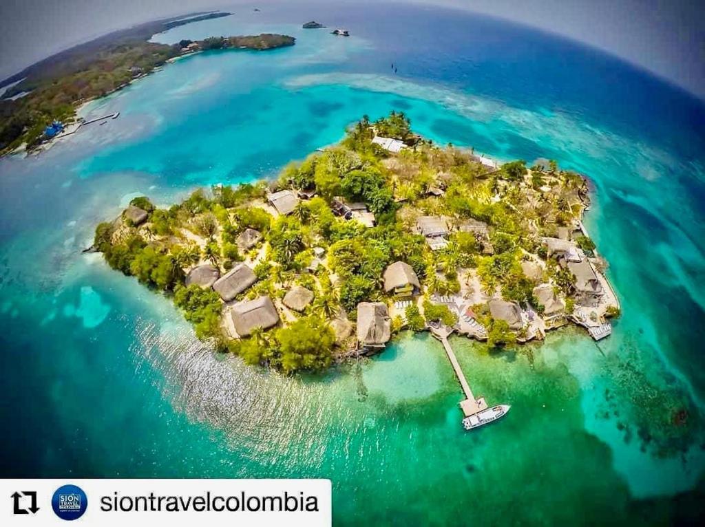 an island in the middle of the water at Hotel Isla Del Pirata in Isla del Pirata