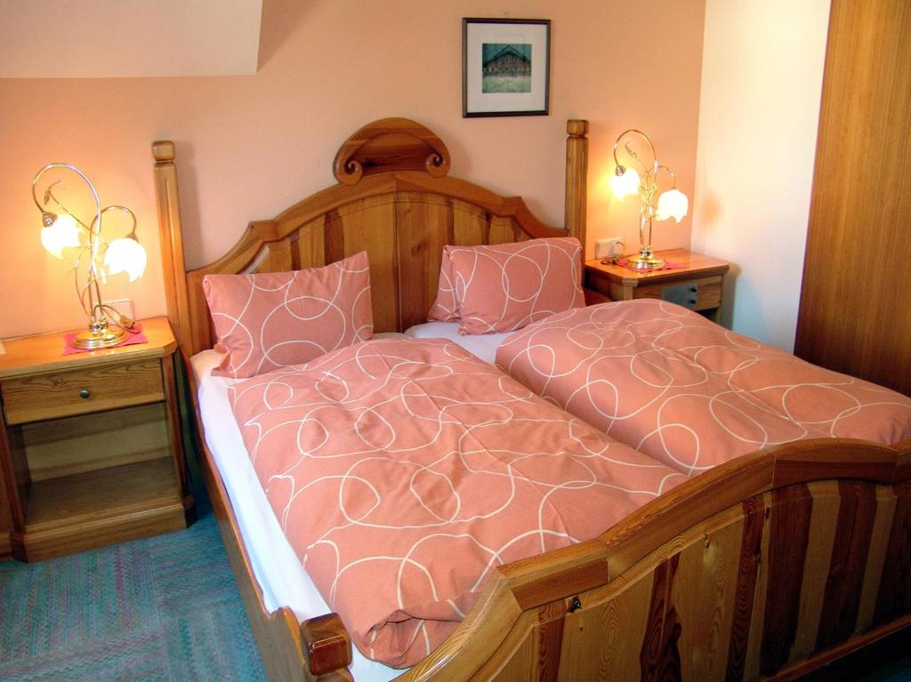 Postel nebo postele na pokoji v ubytování Hotel-Restaurant Fischer