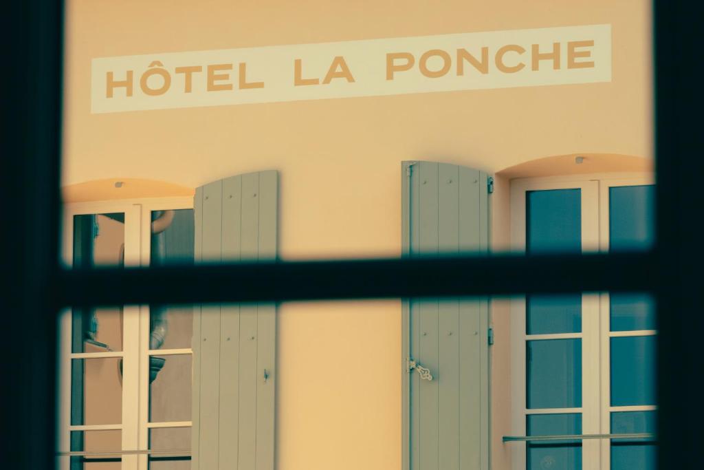 a view of a hotel la porche through a window at Hotel la Ponche in Saint-Tropez