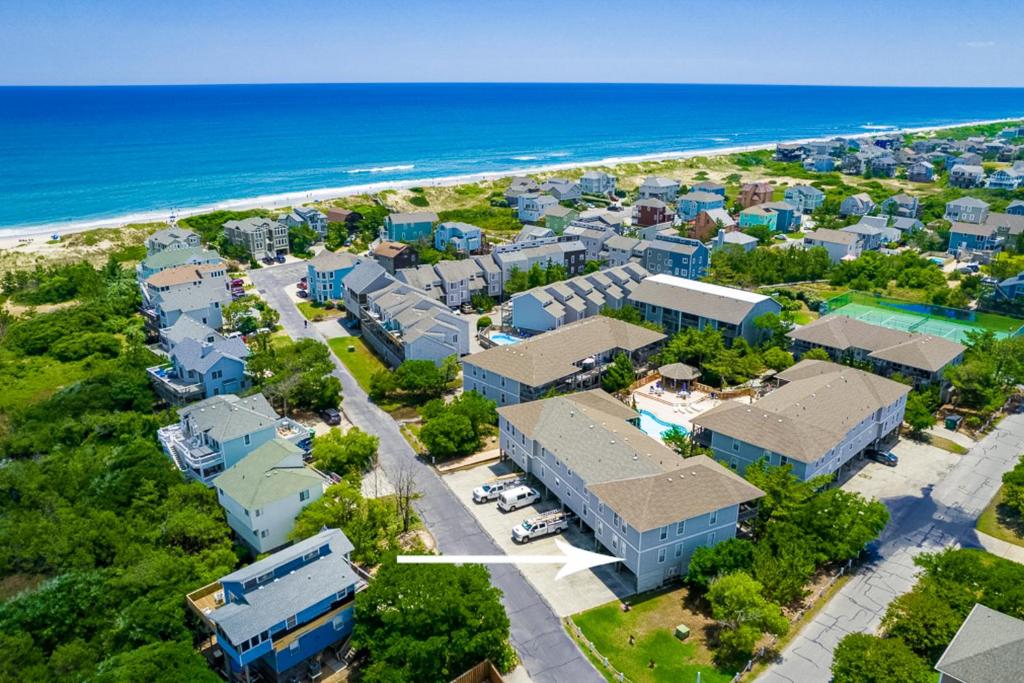 an aerial view of a resort next to the beach at Loisstorm OS22 in Corolla