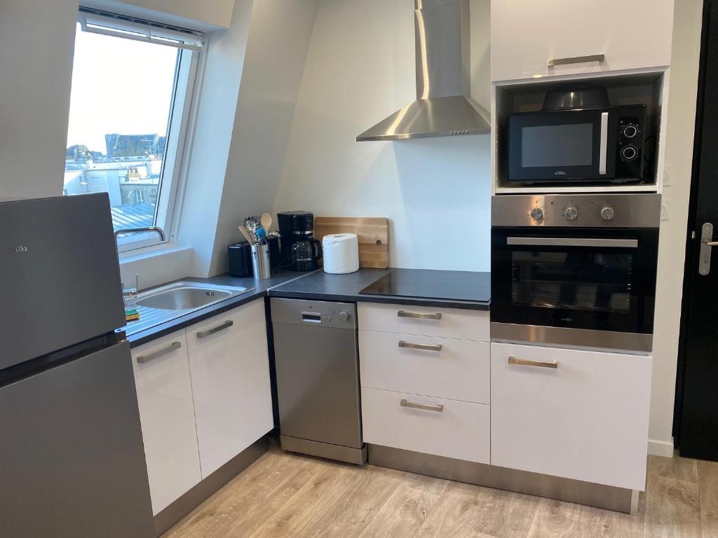 Centre ville Granville à 50m de la mer - ANCV accepté - One-Bedroom Apartment