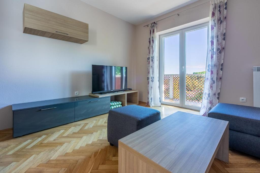 Telewizja i/lub zestaw kina domowego w obiekcie House Vicky