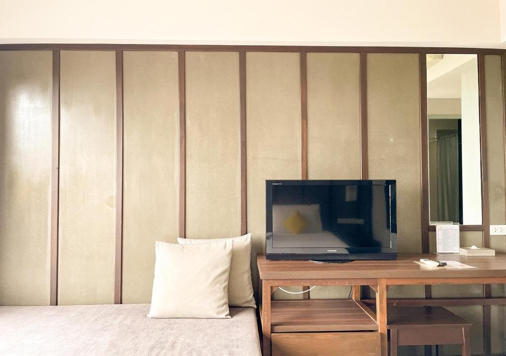 TV a/nebo společenská místnost v ubytování La Lune Beach Resort
