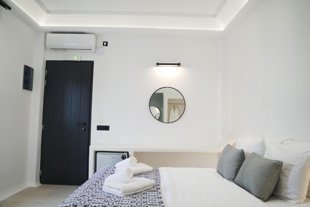 Postel nebo postele na pokoji v ubytování King's Suites