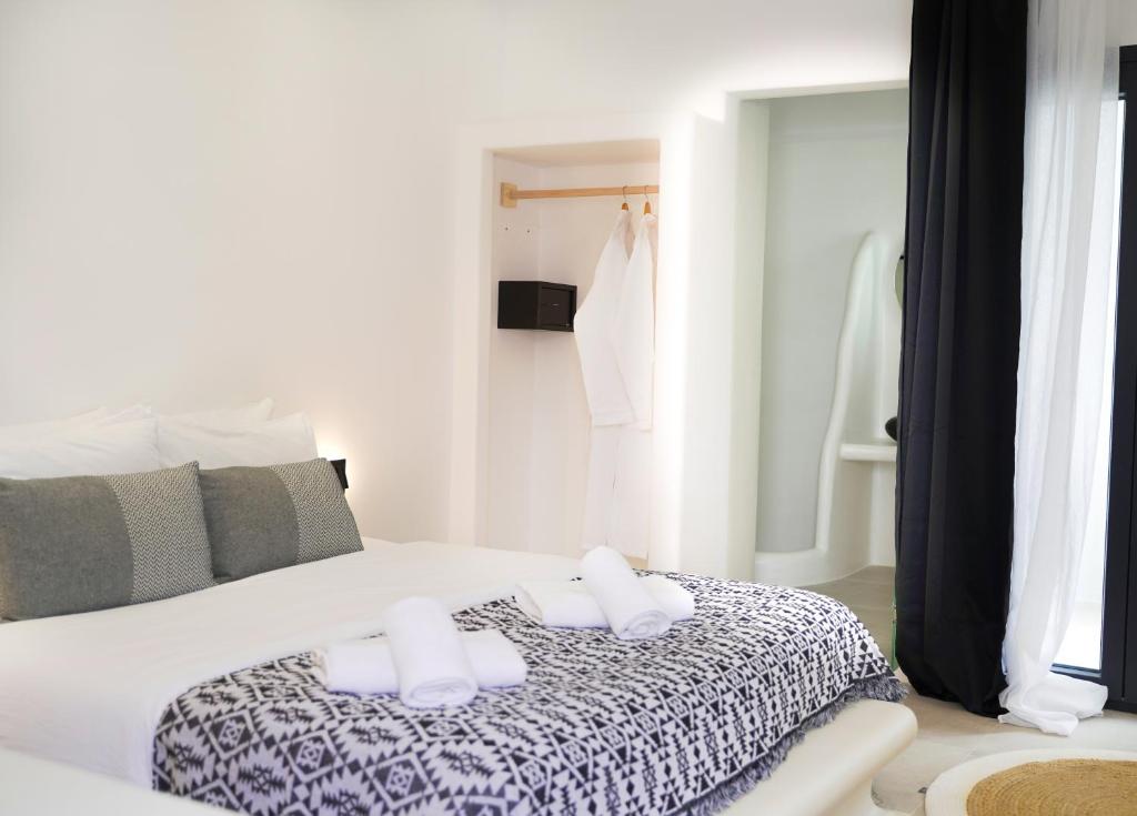 Postel nebo postele na pokoji v ubytování King's Suites