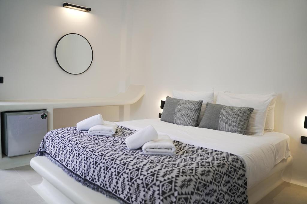 Postel nebo postele na pokoji v ubytování King's Suites