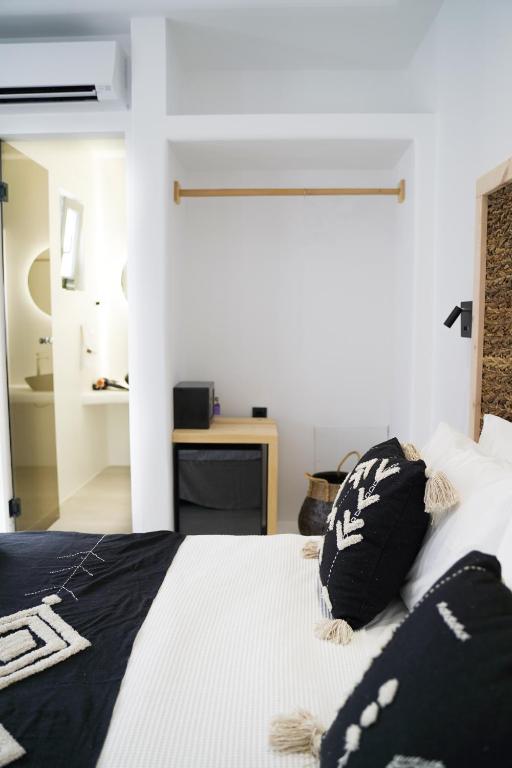 Postel nebo postele na pokoji v ubytování King's Suites
