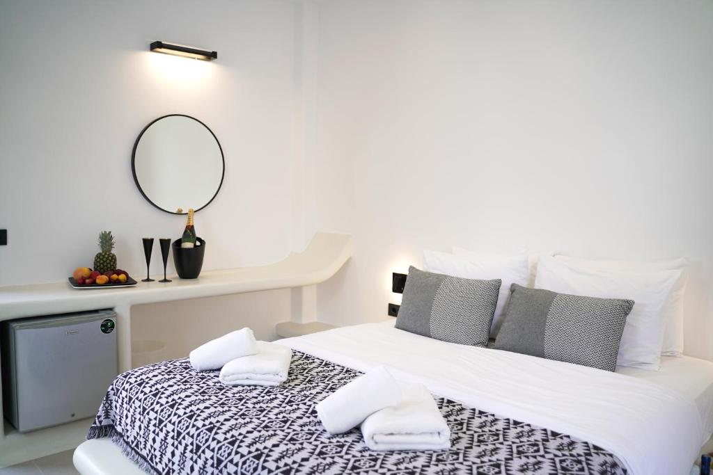 Postel nebo postele na pokoji v ubytování King's Suites