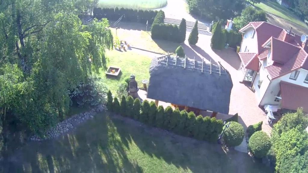 Fotografia z galérie ubytovania Agro Breza - dom z kominkiem 20 metrow od jeziora- sauna ogrodowa v destinácii Lipusz