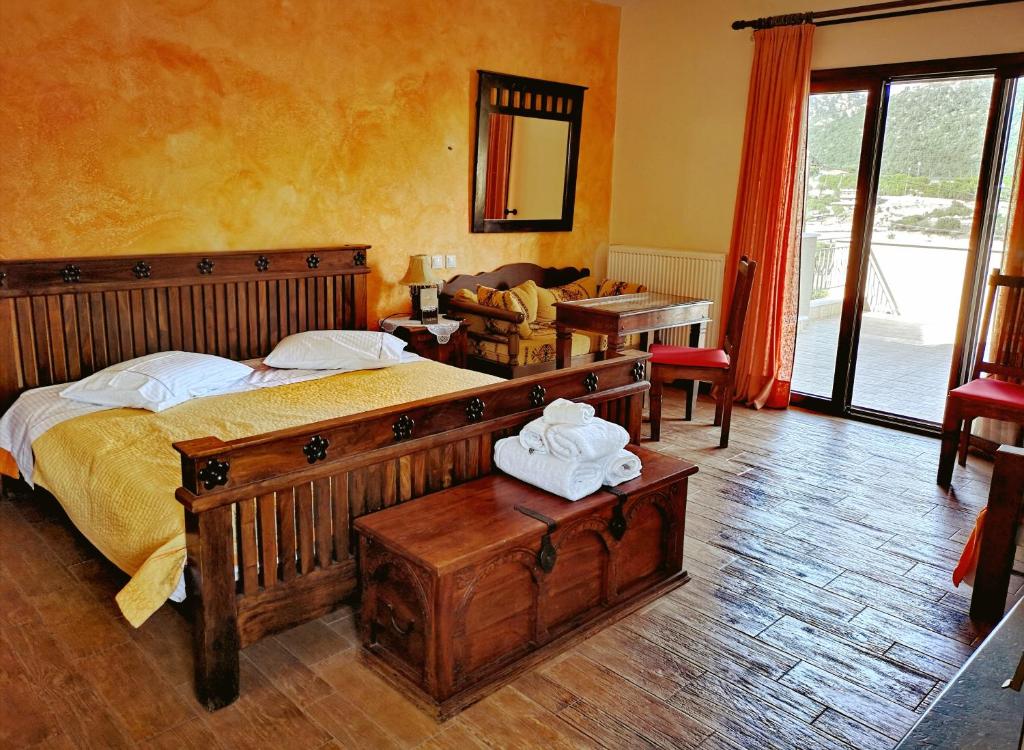 Postel nebo postele na pokoji v ubytování Flygonion Guesthouse