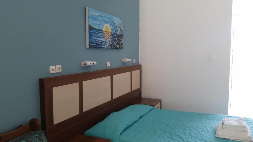 Postel nebo postele na pokoji v ubytování Troulis Seaside