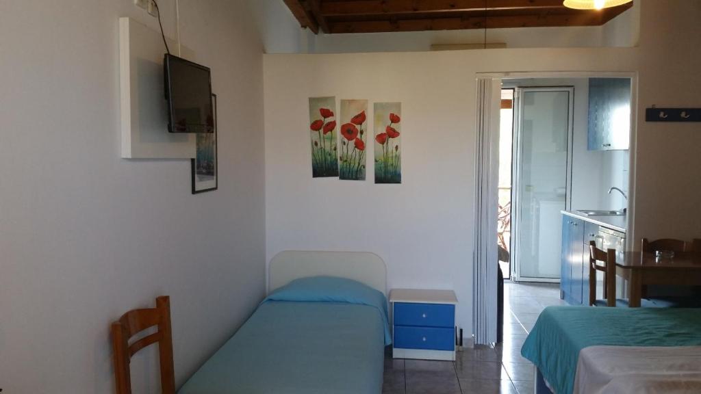 Postel nebo postele na pokoji v ubytování Troulis Seaside