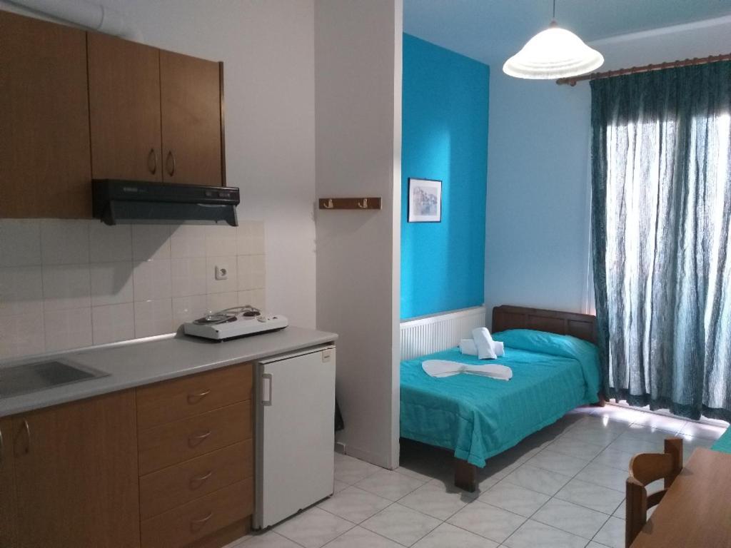 Postel nebo postele na pokoji v ubytování Troulis Seaside