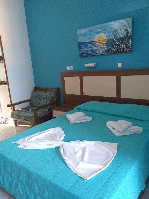 Postel nebo postele na pokoji v ubytování Troulis Seaside
