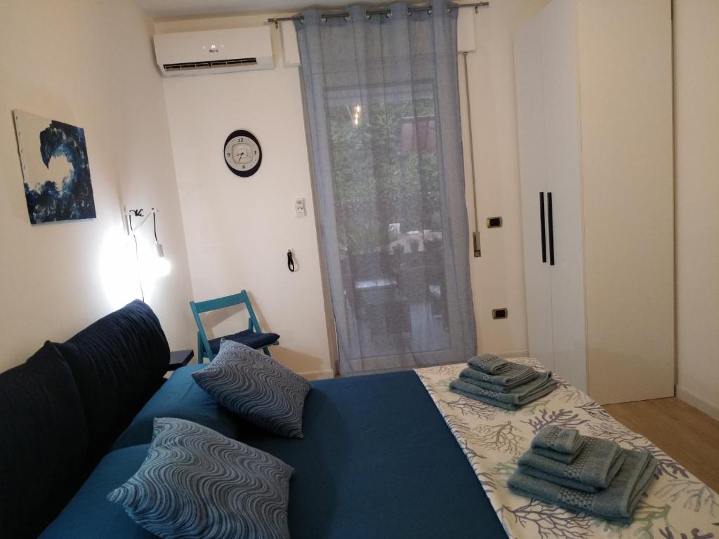 Postel nebo postele na pokoji v ubytování B&B Alghero Reina