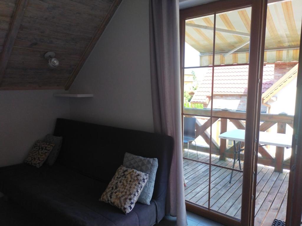 Posezení v ubytování Apartament z tarasem
