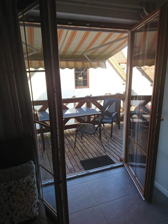 Posezení v ubytování Apartament z tarasem