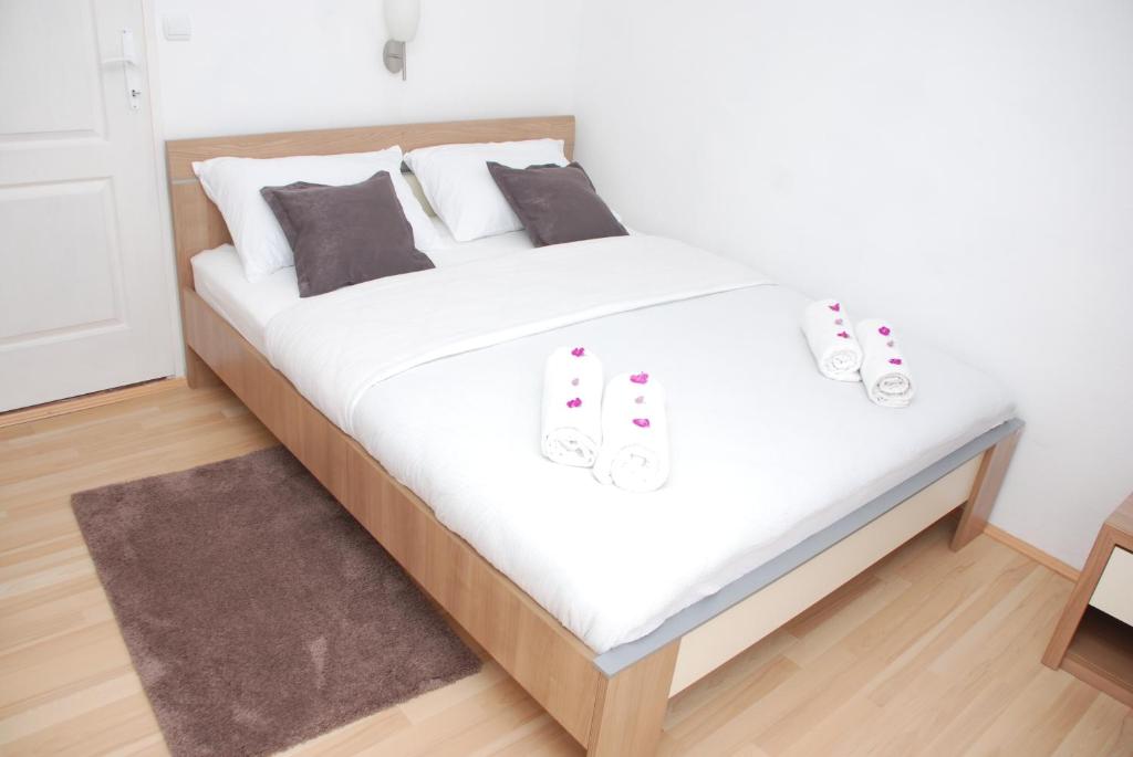 Postel nebo postele na pokoji v ubytování Apartment Danubius