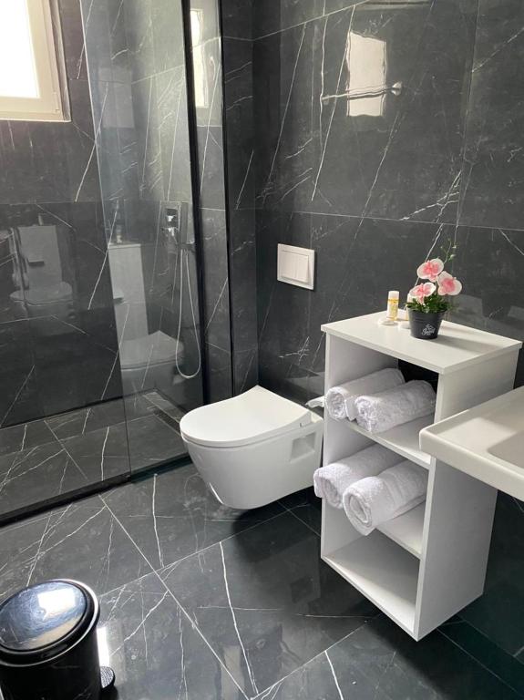 Koupelna v ubytování Hotel Viroi