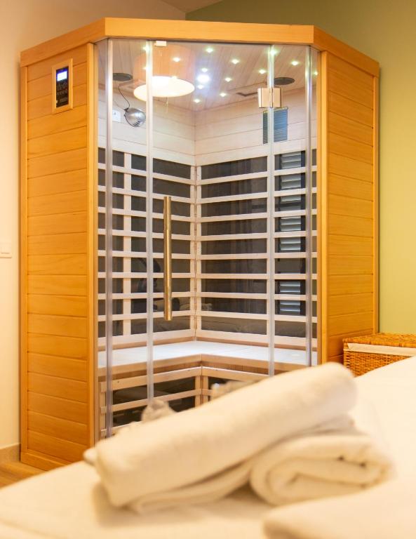 Postel nebo postele na pokoji v ubytování Hotel U Ricordu & Spa