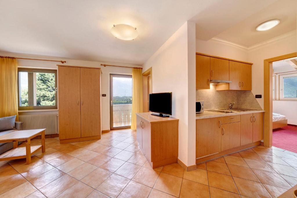 Televízia a/alebo spoločenská miestnosť v ubytovaní Weinsepphof Ferienwohnung 4