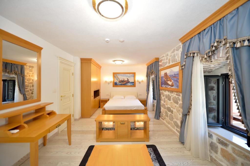 Postel nebo postele na pokoji v ubytování SEASIDE HOUSE KOTOR