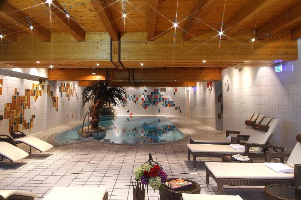 Bazén v ubytování Hotel Mariandl - Singender Wirt nebo v jeho okolí