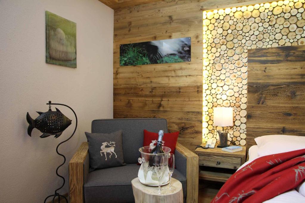 Postel nebo postele na pokoji v ubytování Hotel Mariandl - Singender Wirt