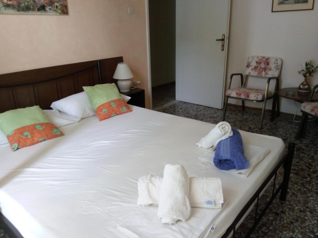 Postel nebo postele na pokoji v ubytování Agnes Rooms