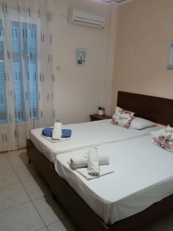 Postel nebo postele na pokoji v ubytování Agnes Rooms