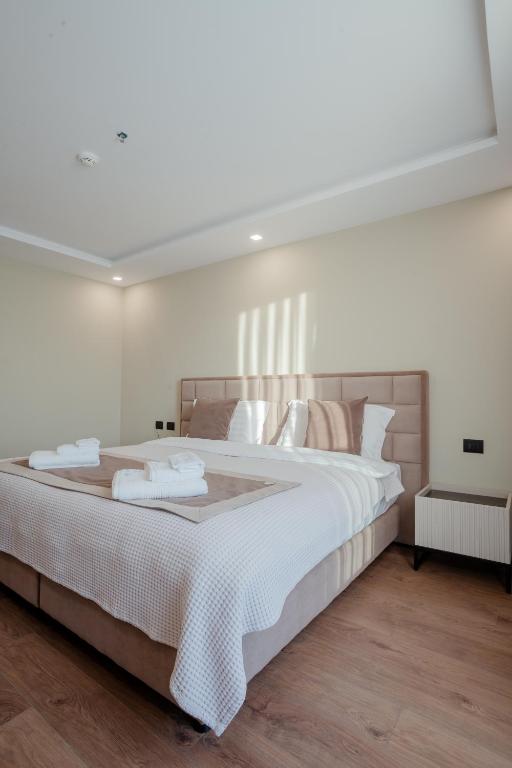 Postel nebo postele na pokoji v ubytování Royal East Resort