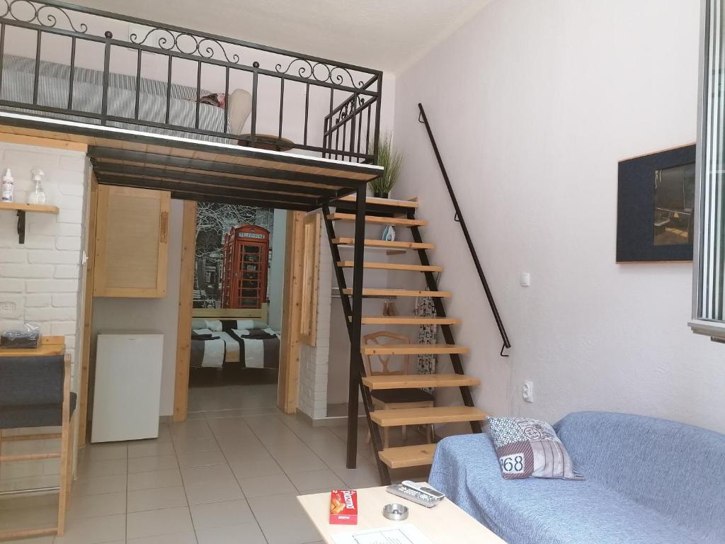 Voodi või voodid majutusasutuse Apartmani Sirmium toas