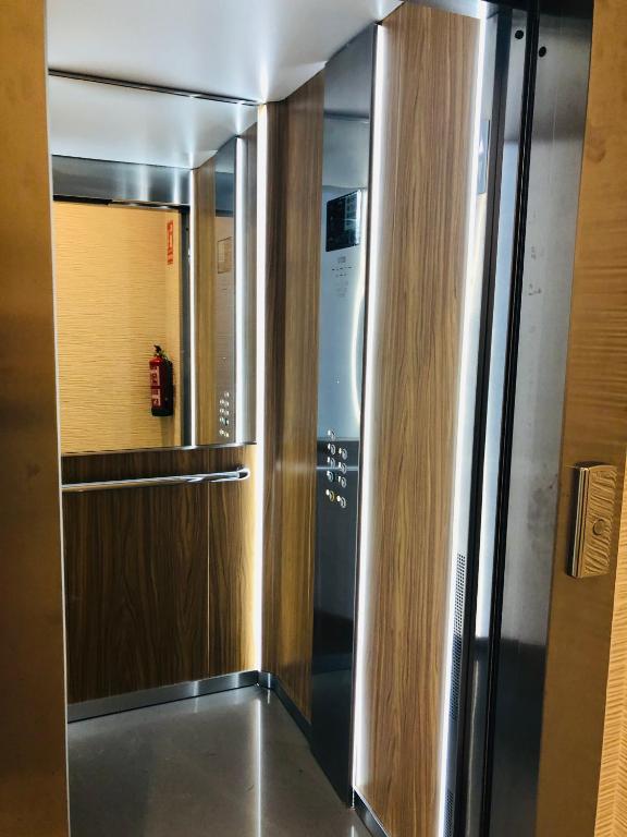 Kuchyň nebo kuchyňský kout v ubytování Apartamentos Deluxe Strada