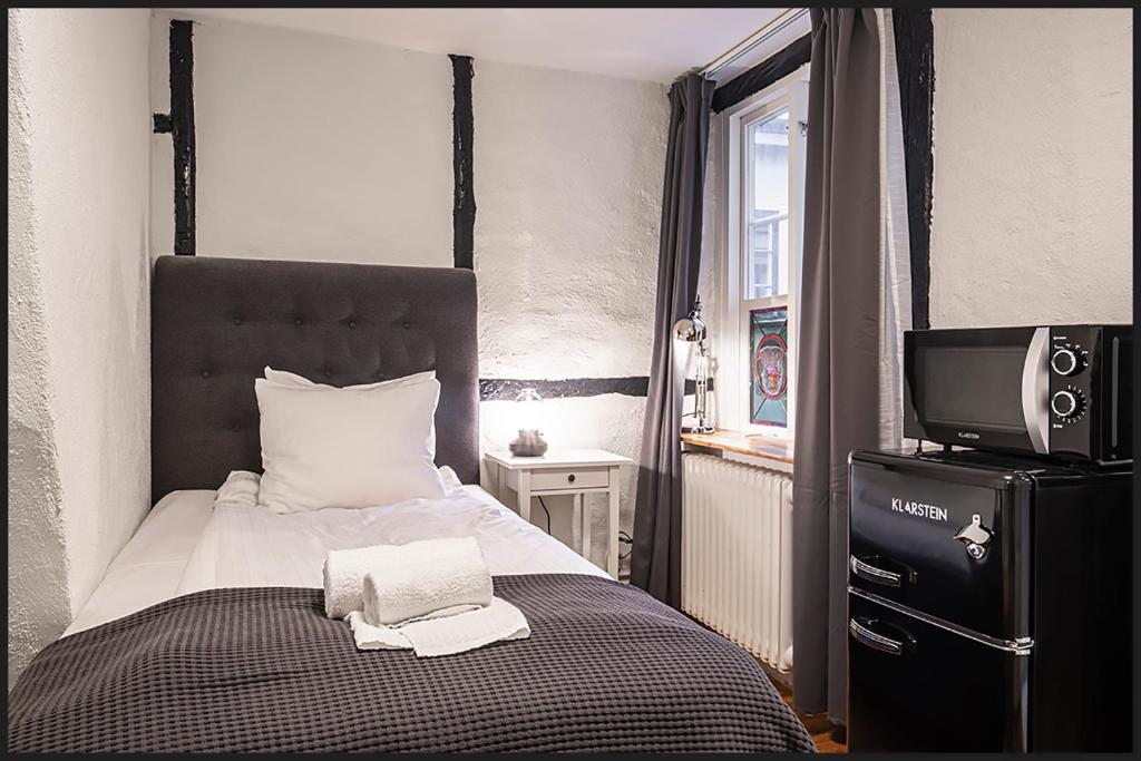 Postel nebo postele na pokoji v ubytování Continental Apartment Hotel Helsingborg