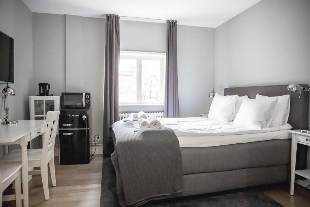 Postel nebo postele na pokoji v ubytování Continental Apartment Hotel Helsingborg