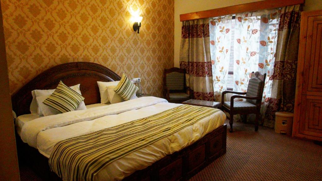 Postel nebo postele na pokoji v ubytování The Shelter Heritage A Boutique Hotel