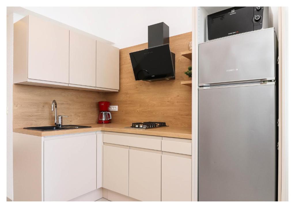 Kuchyň nebo kuchyňský kout v ubytování Apartment Jerko 2