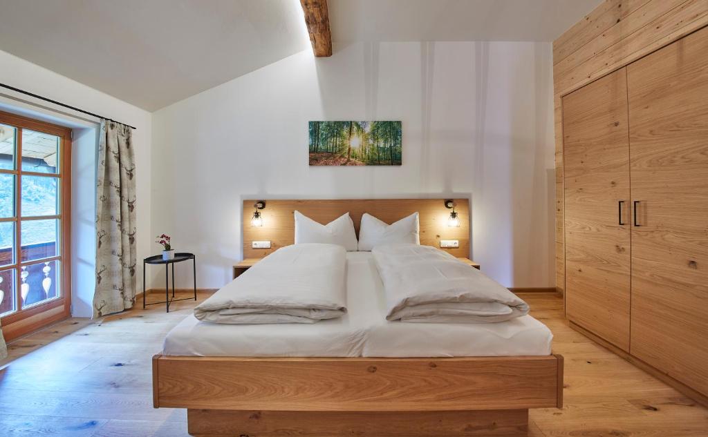 Postel nebo postele na pokoji v ubytování Feriengut Streitberg Appartements