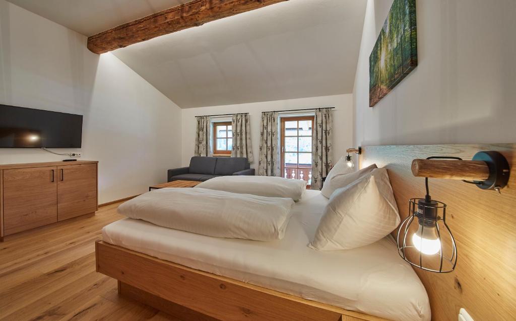Postel nebo postele na pokoji v ubytování Feriengut Streitberg Appartements