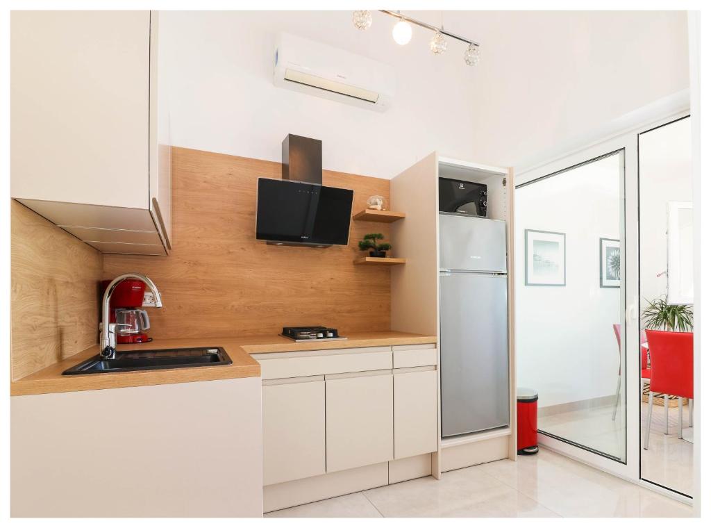 Kuchyň nebo kuchyňský kout v ubytování Apartment Jerko 2