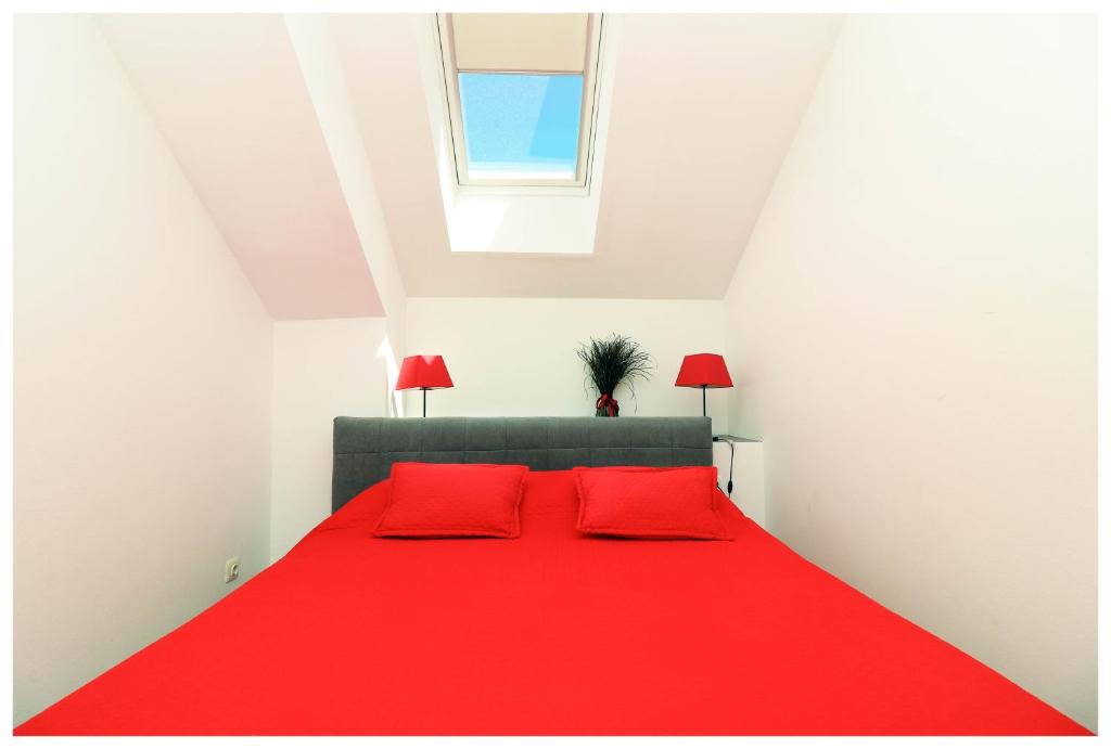 Postel nebo postele na pokoji v ubytování Apartment Jerko 2