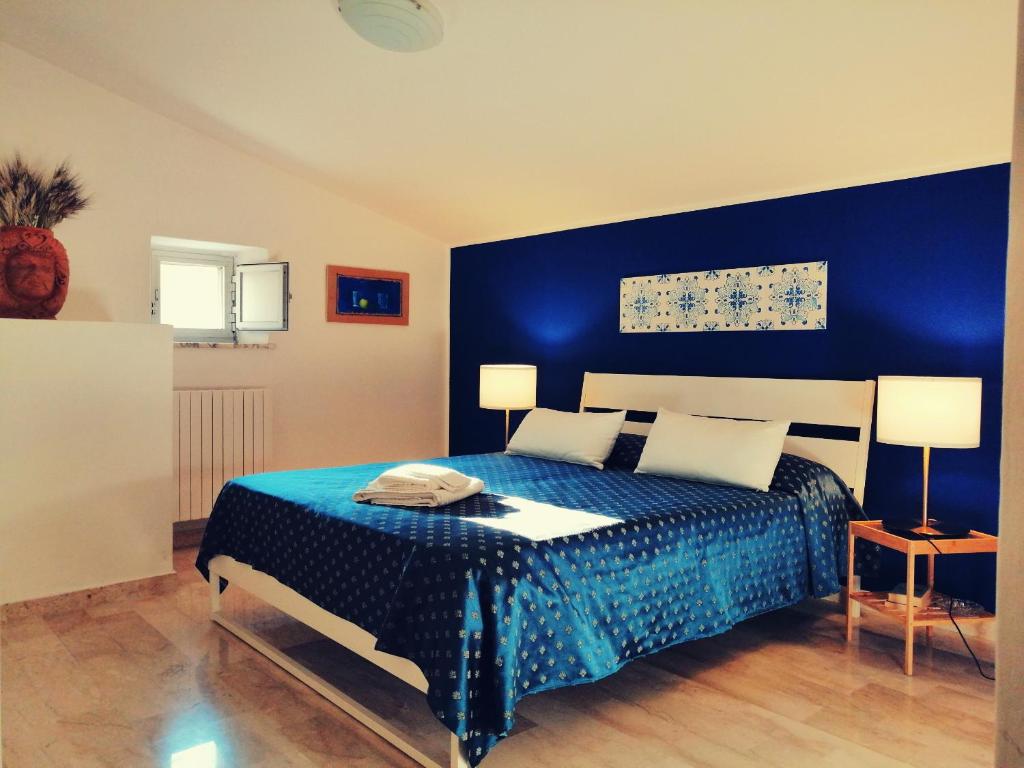 Postel nebo postele na pokoji v ubytování Liz House