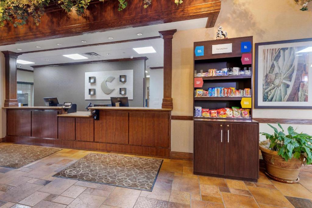 a lobby of a pharmacy with a waiting room at Comfort Suites Marshall in Marshall