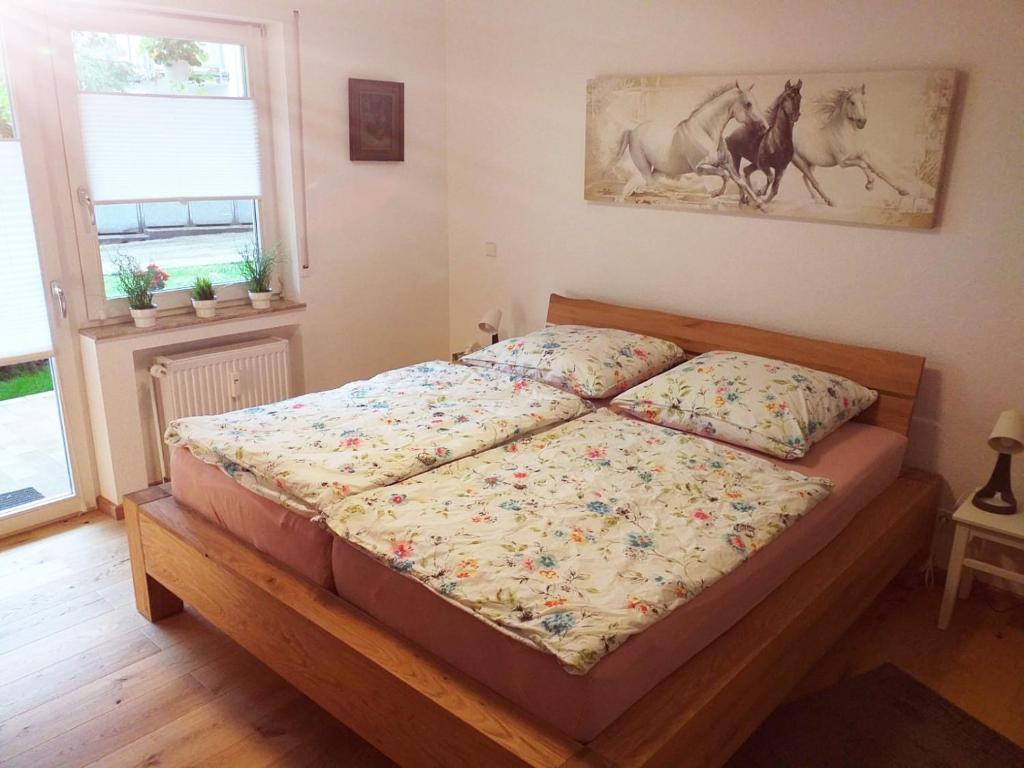 Säng eller sängar i ett rum på Ferienwohnung Am Michelsbach