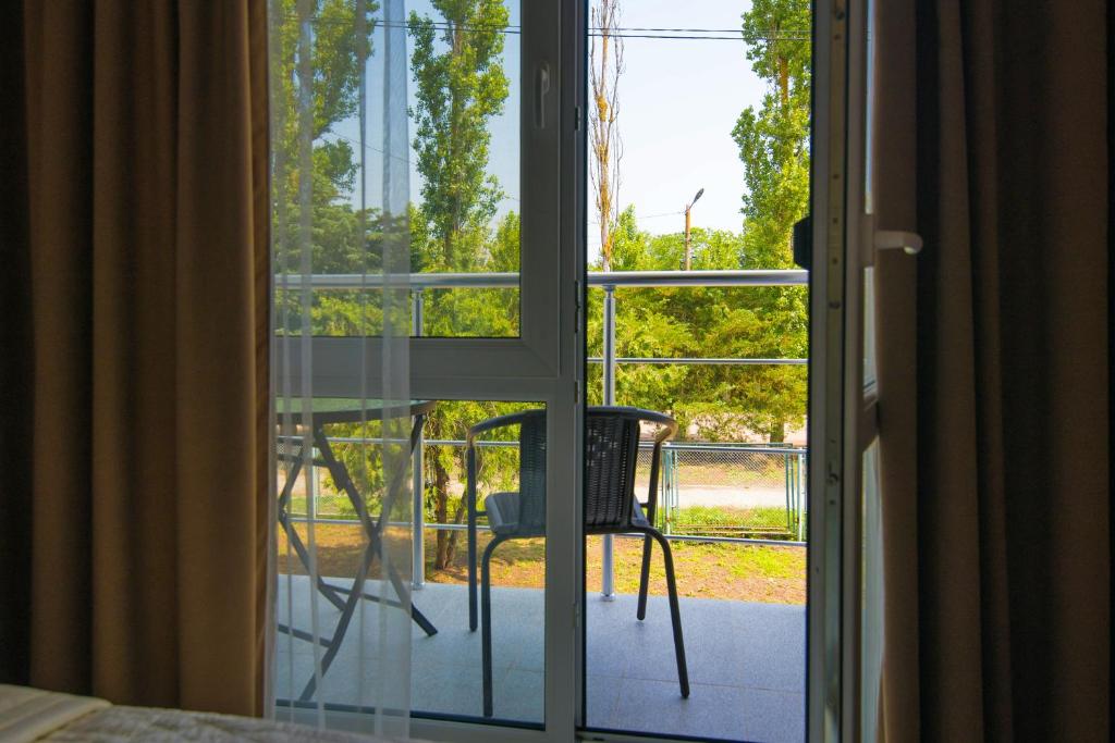 Balkón nebo terasa v ubytování REEF Hotel