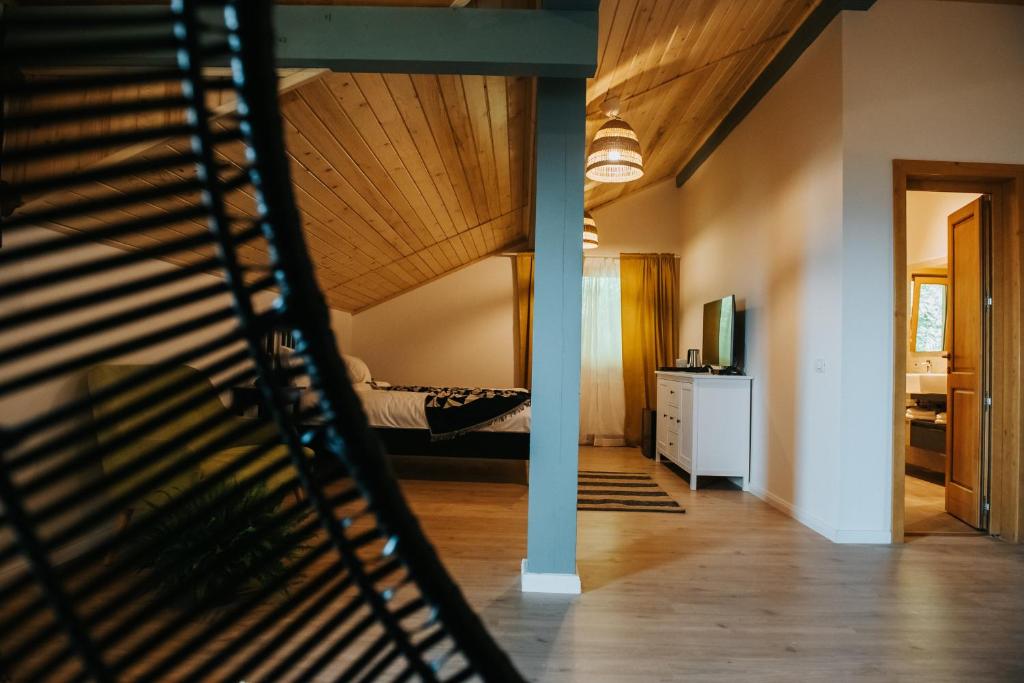 Postel nebo postele na pokoji v ubytování Cabana Fantanele