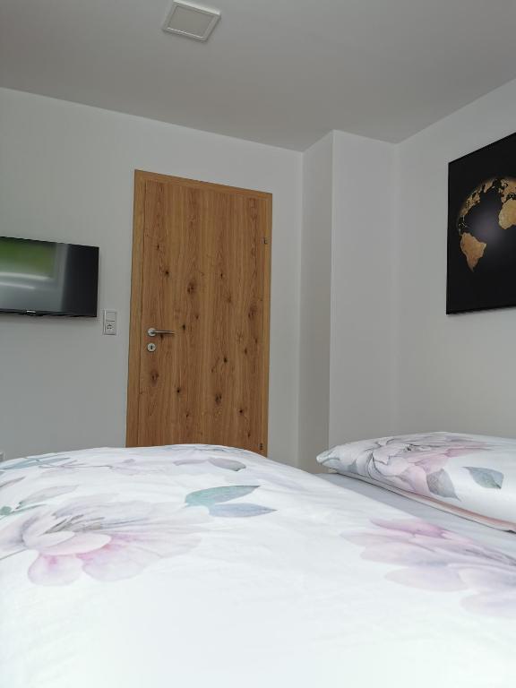 Postel nebo postele na pokoji v ubytování Living Apartment_2