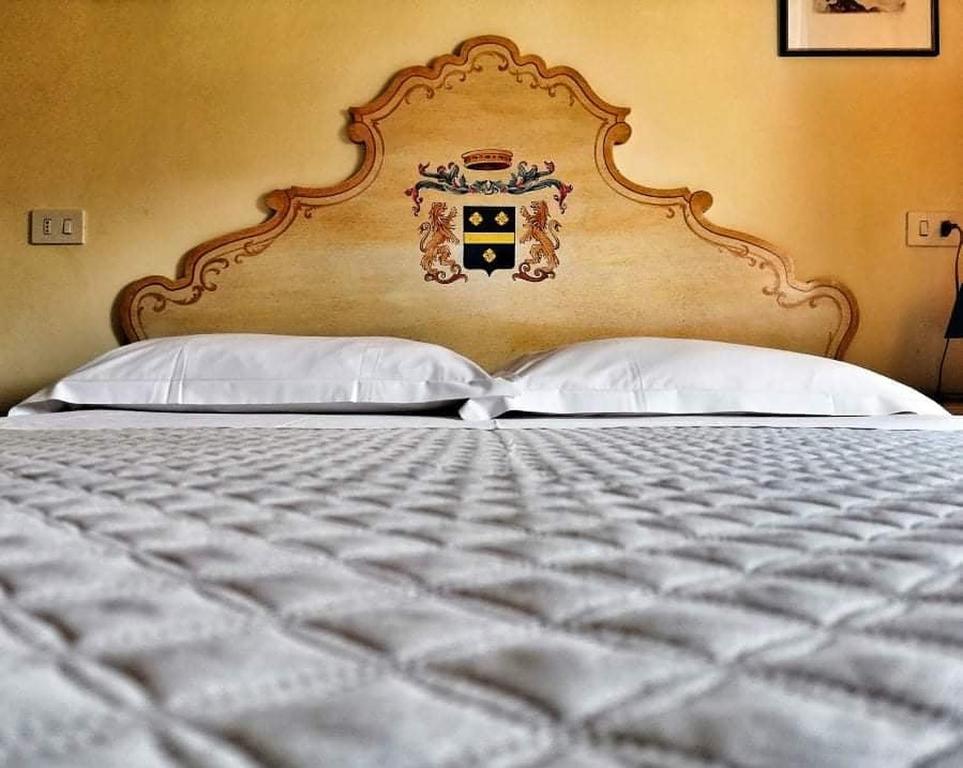 Кровать или кровати в номере Hotel Residence Sant'Anna